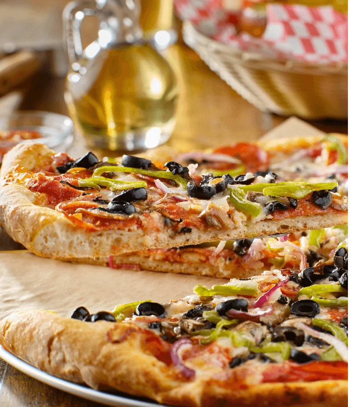 Delicious pepperoni pizza with olives and peppers