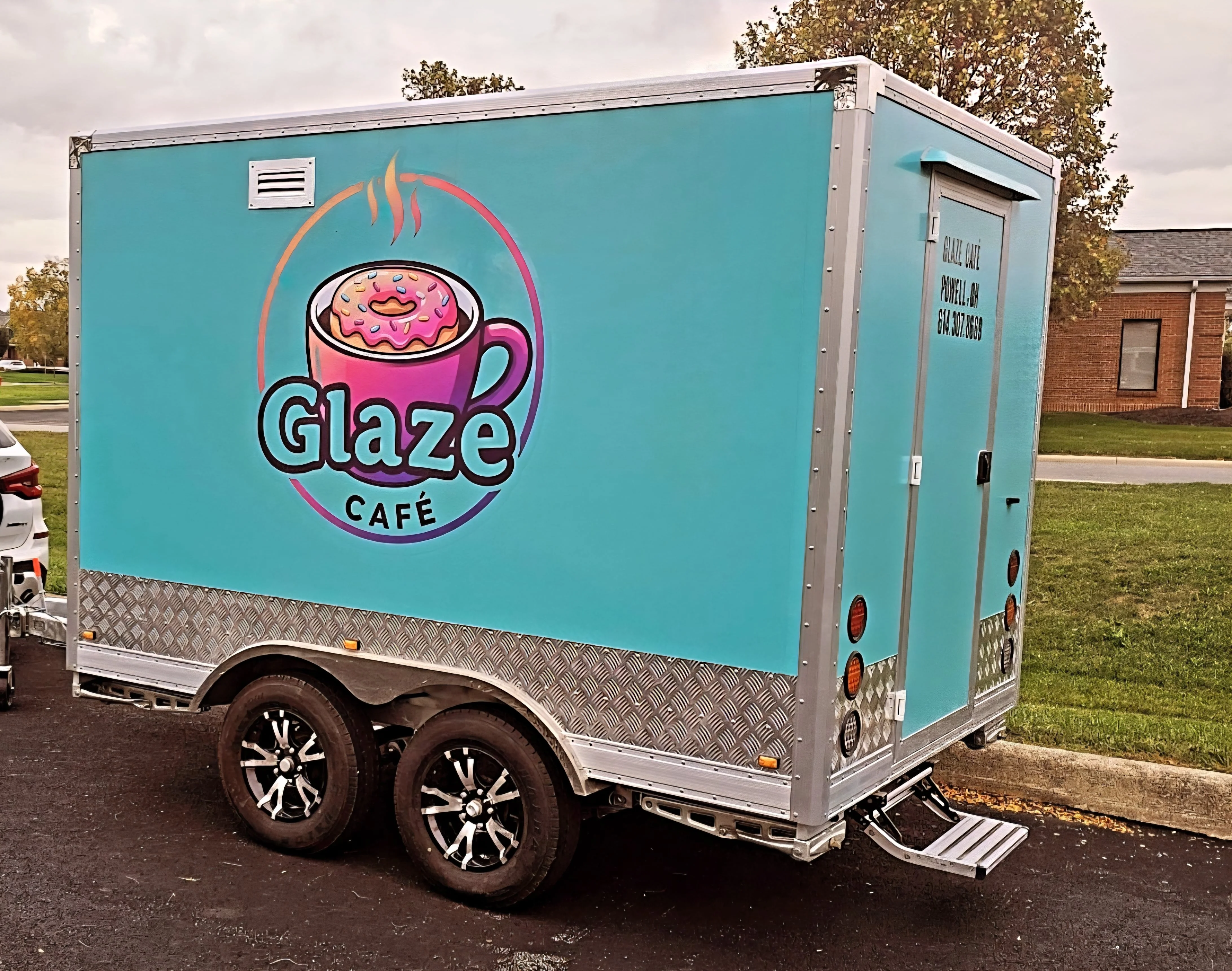 Colorful food truck featuring Glaze Café logo
