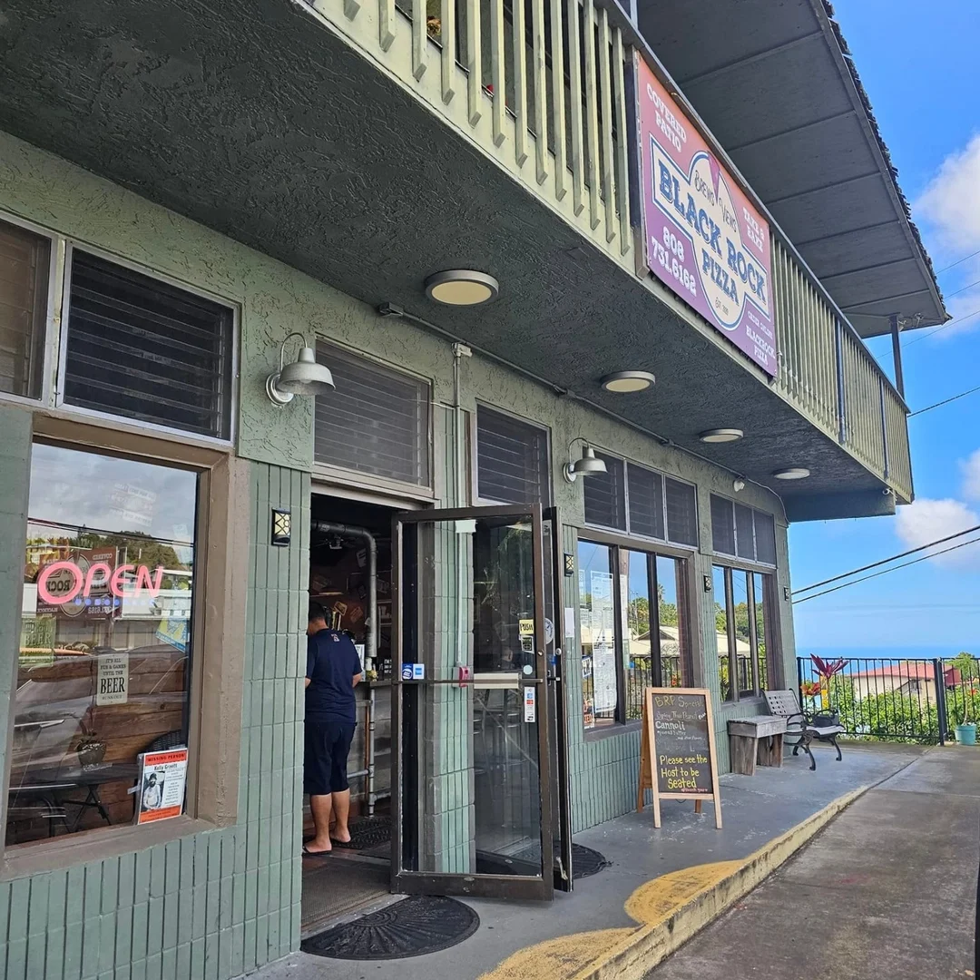 Exterior view of Black Rock Pizza restaurant with open sign