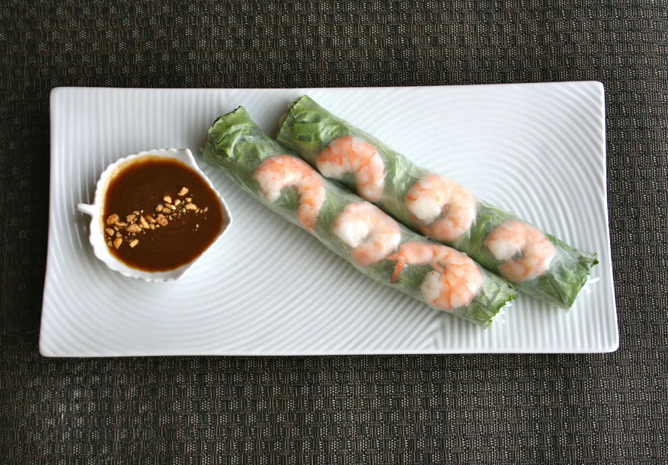 Vietnamese shrimp spring rolls with peanut dipping sauce