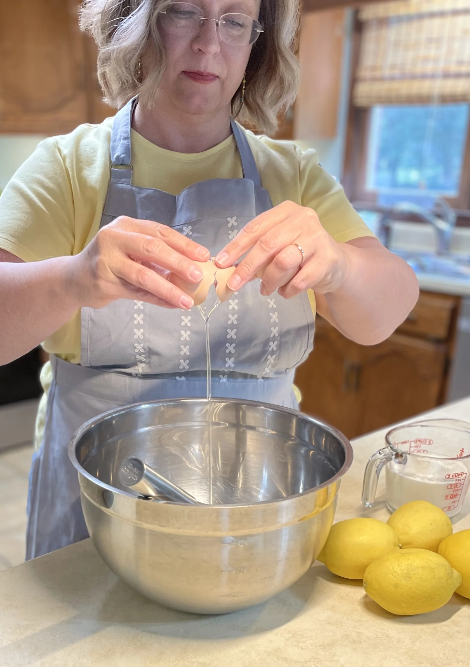 Baking process with eggs and lemons in a kitchen setting