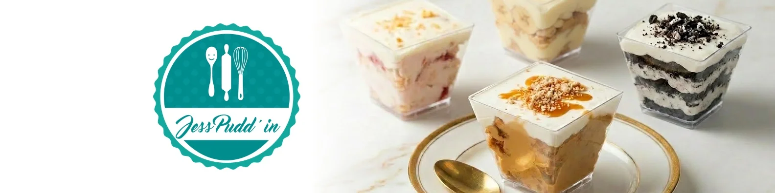 Assorted dessert parfaits in clear cups