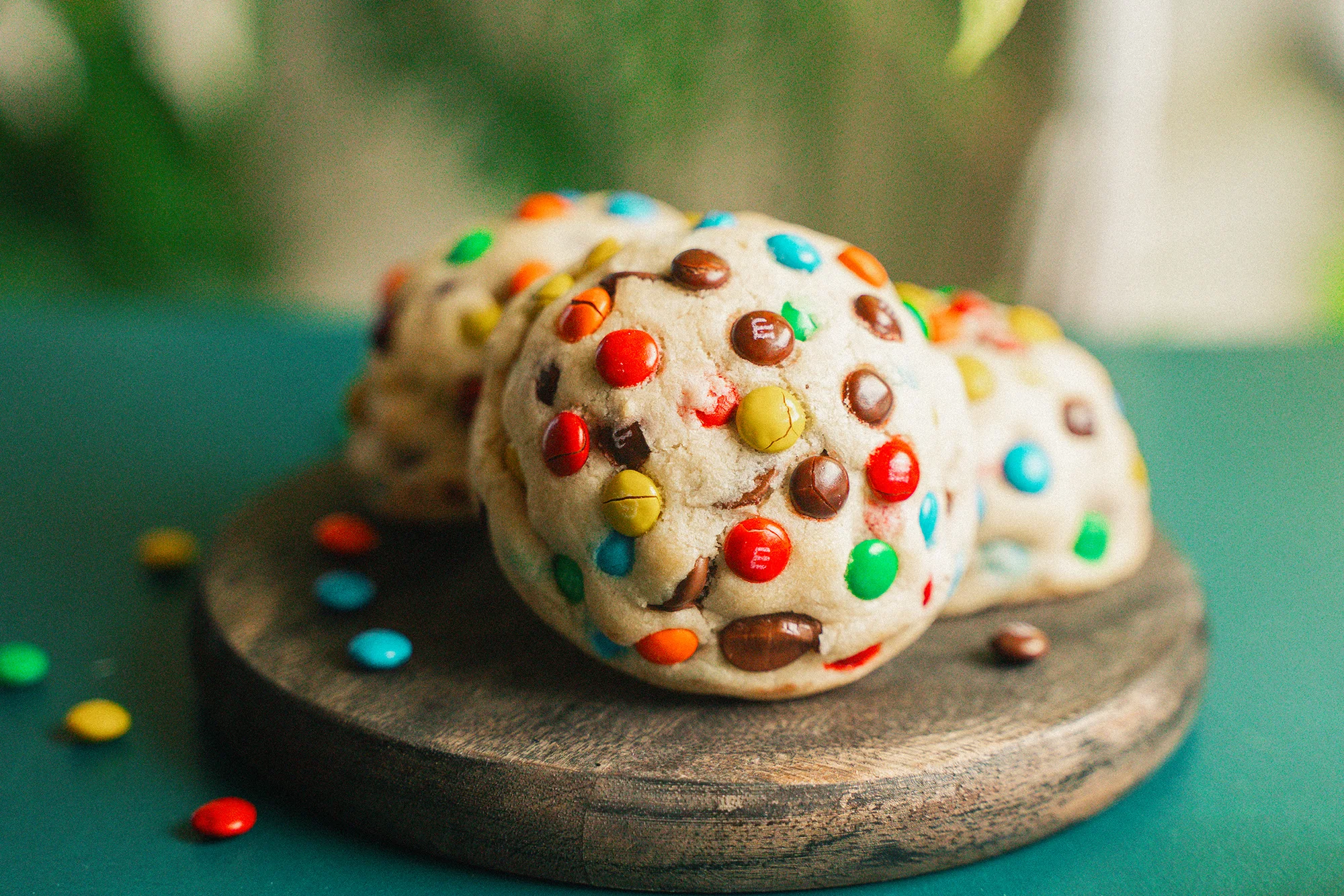 Colorful cookie with chocolate and candy pieces