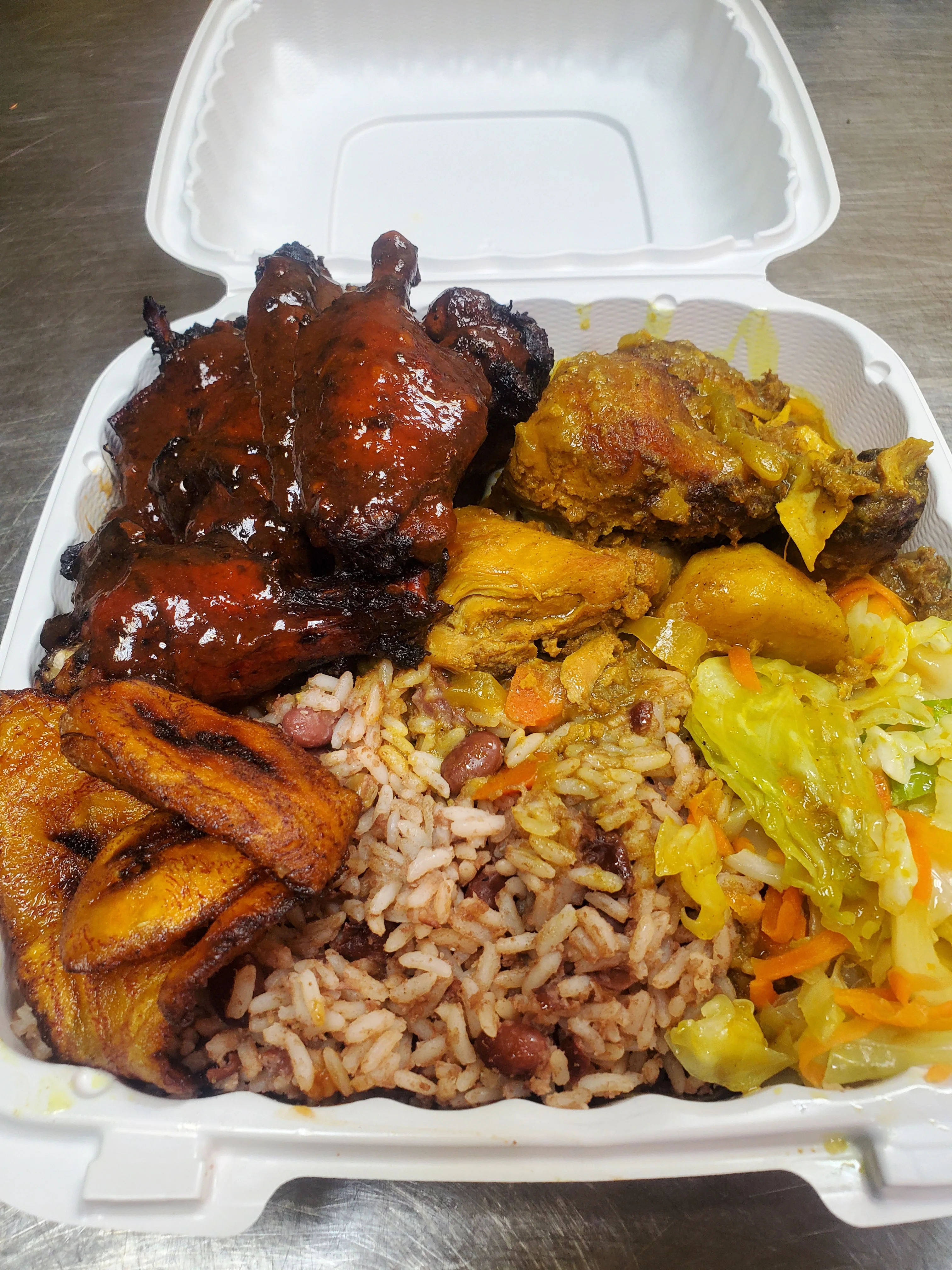 Jamaican jerk chicken with rice and peas