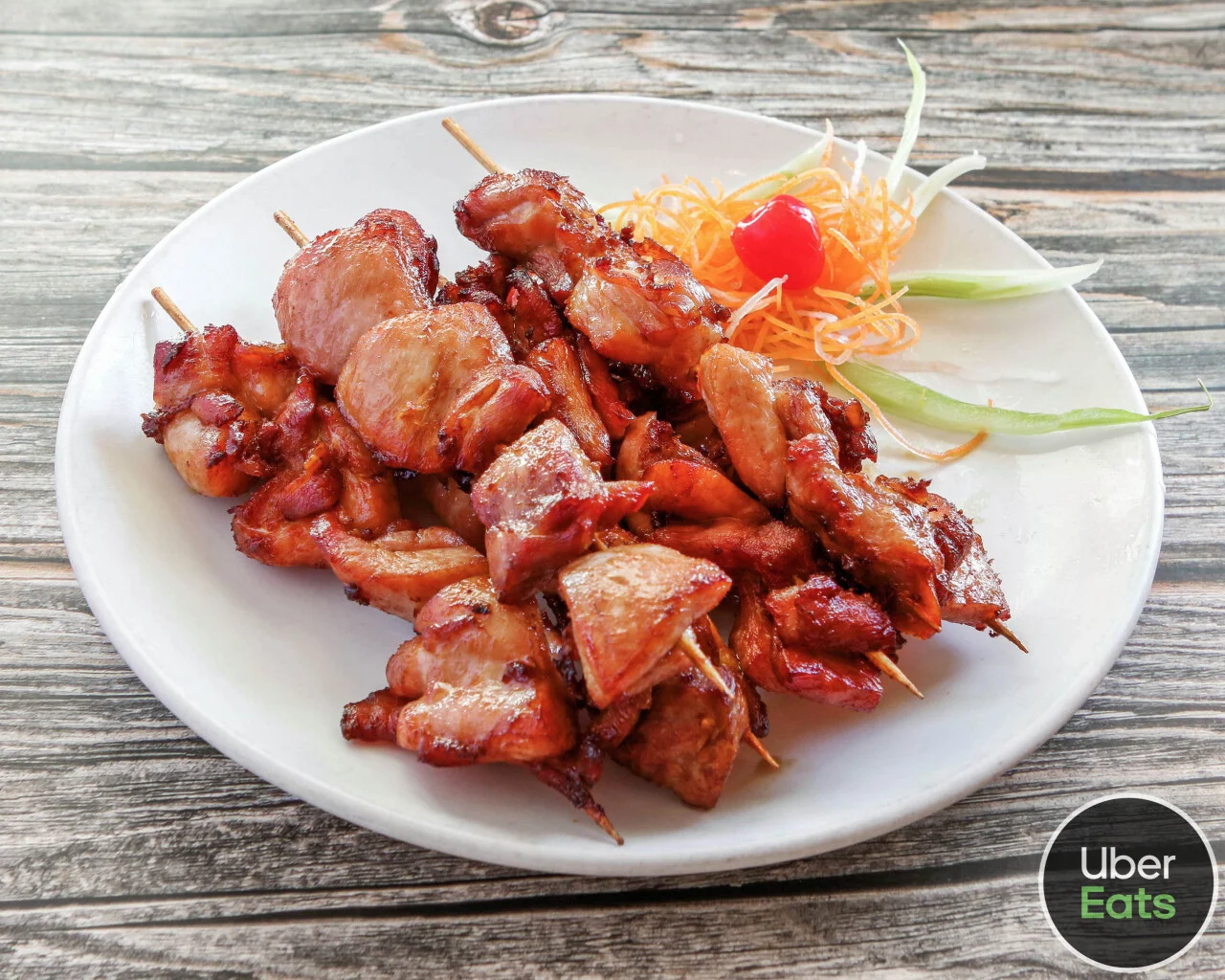 Grilled chicken skewers, a popular Southeast Asian street food