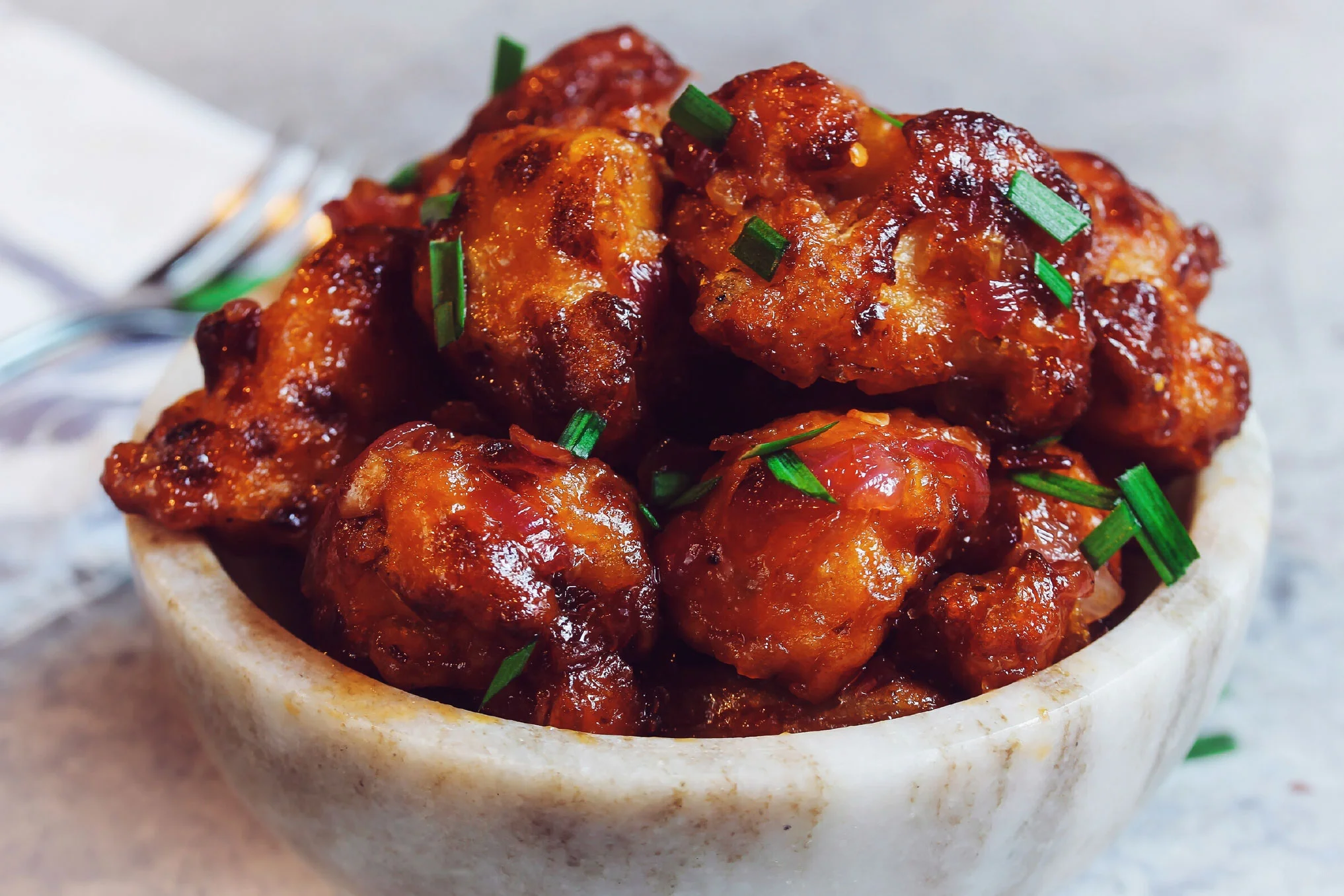 A delicious plate of Gobi, featuring crispy cauliflower and spices.