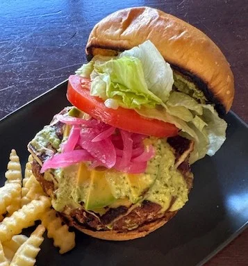 Delicious veggie burger with fresh toppings and crinkle fries