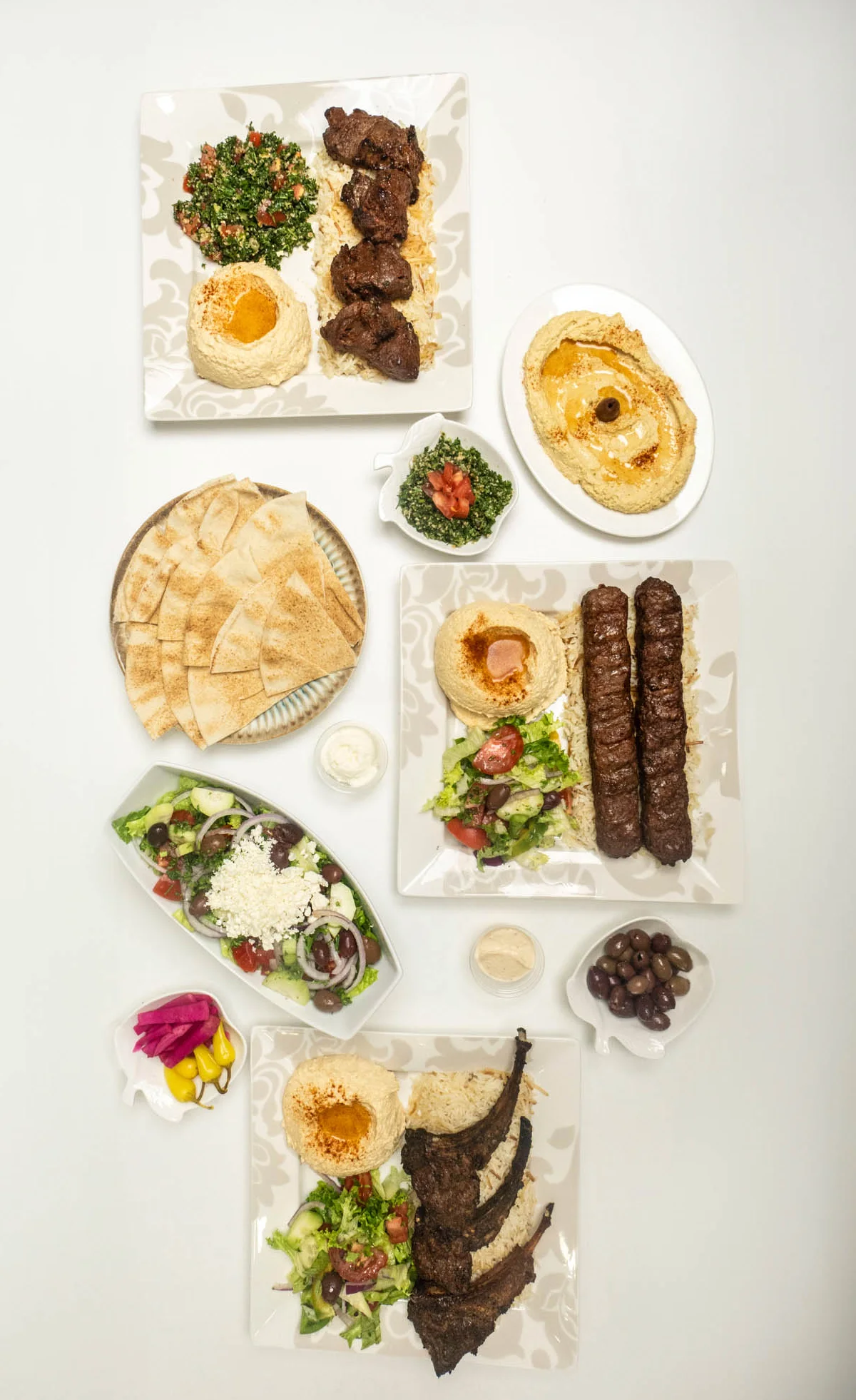 Mediterranean mixed grill platter with kebabs and hummus