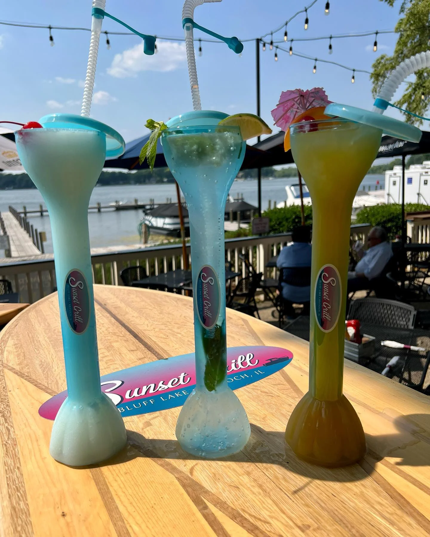 Blue tiki drinks on the Sunset Grill patio