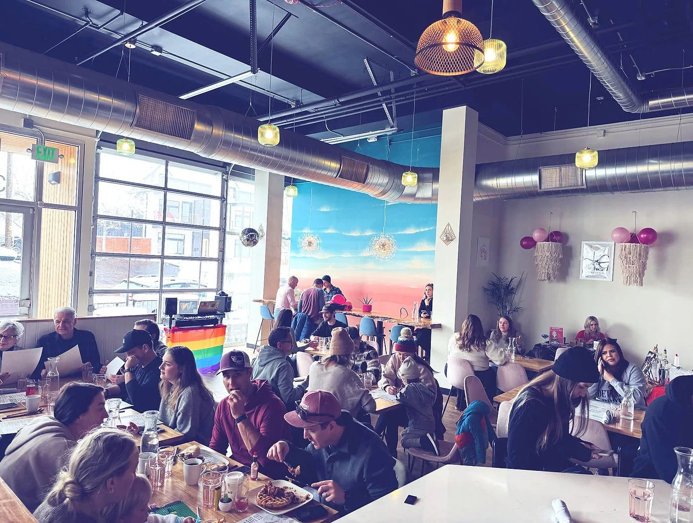 Vibrant restaurant interior with colorful decor and lively atmosphere