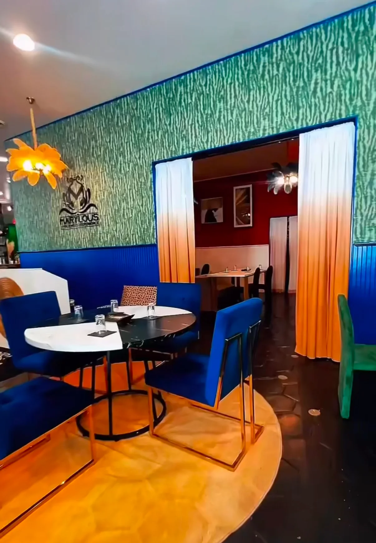 Vibrant restaurant interior with colorful decor and stylish seating