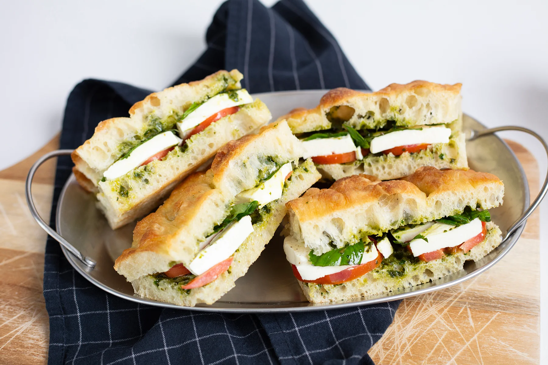 Italian focaccia sandwich with fresh mozzarella and pesto