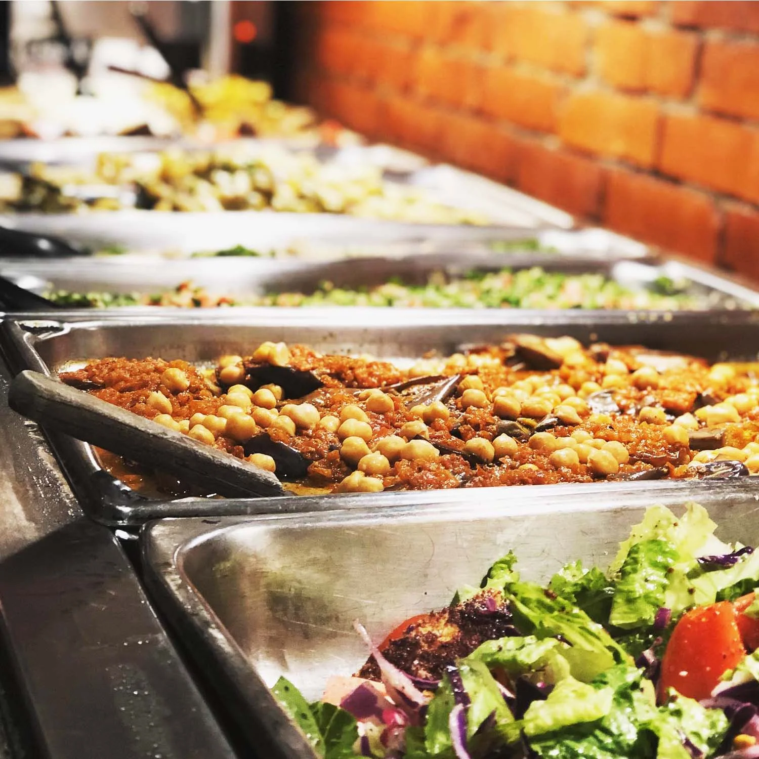 Mediterranean buffet with chickpea stew and fresh salads