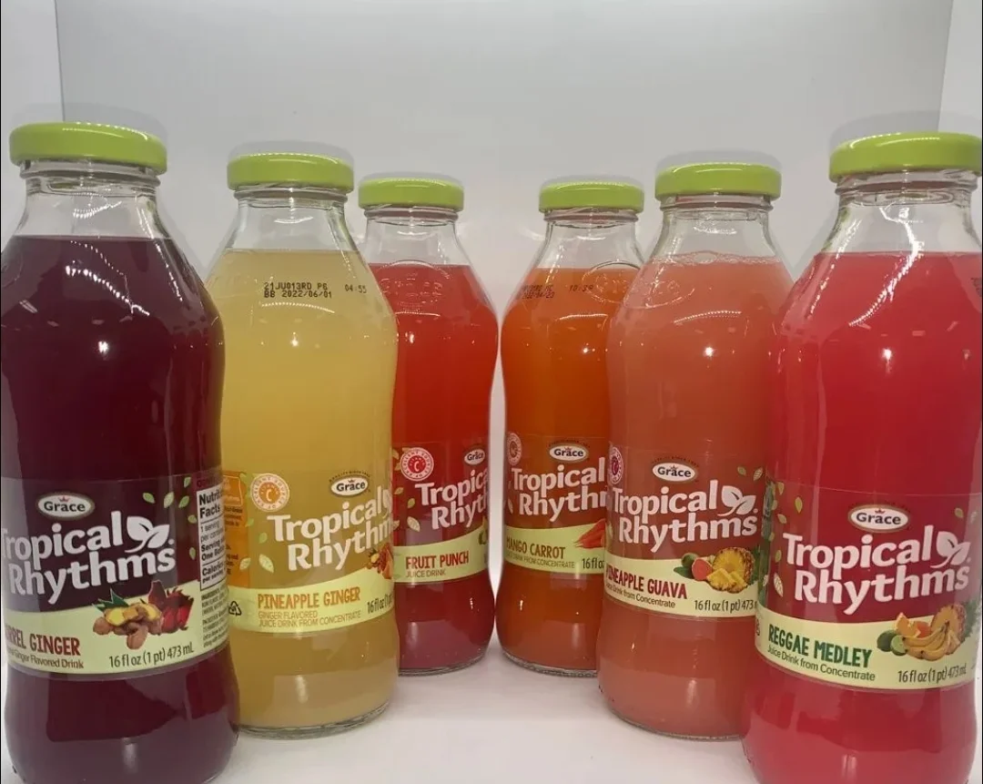 Variety of Tropical Rhythms beverages in colorful bottles