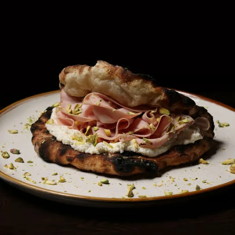 Italian focaccia sandwich with ham and ricotta