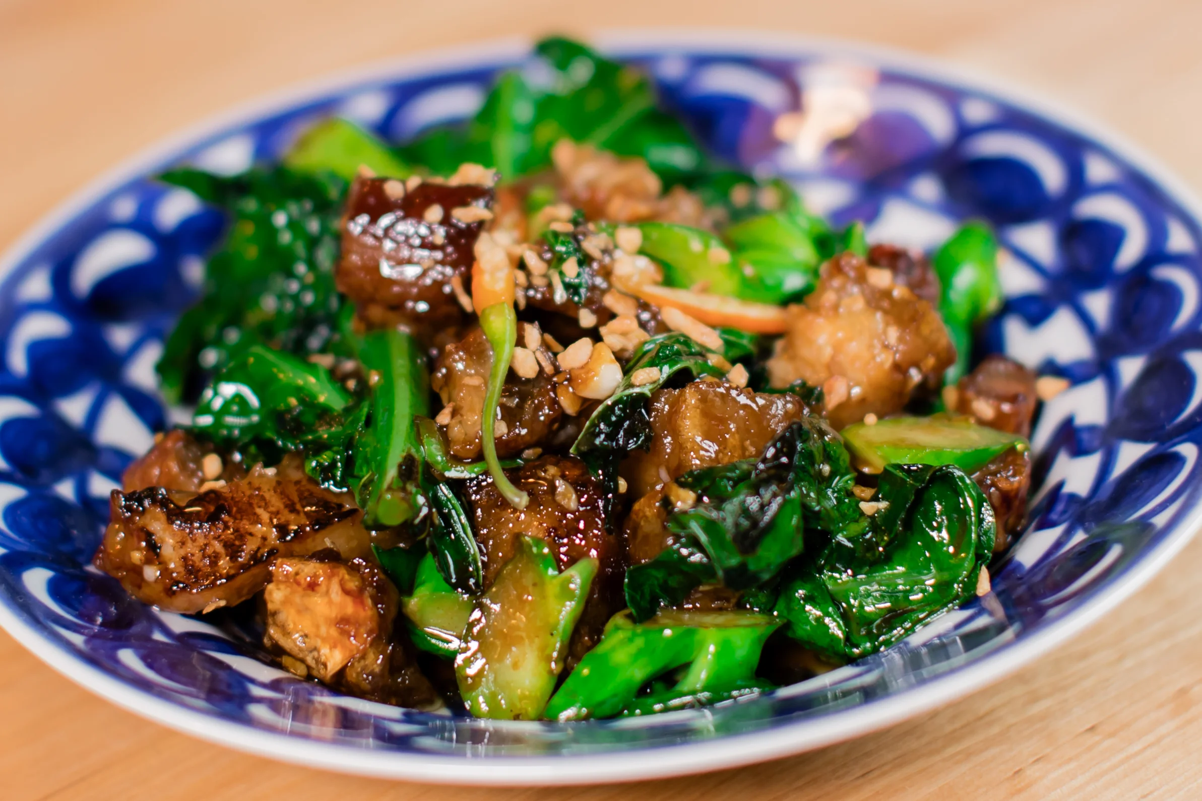 Stir-fried Chinese greens with crispy tofu