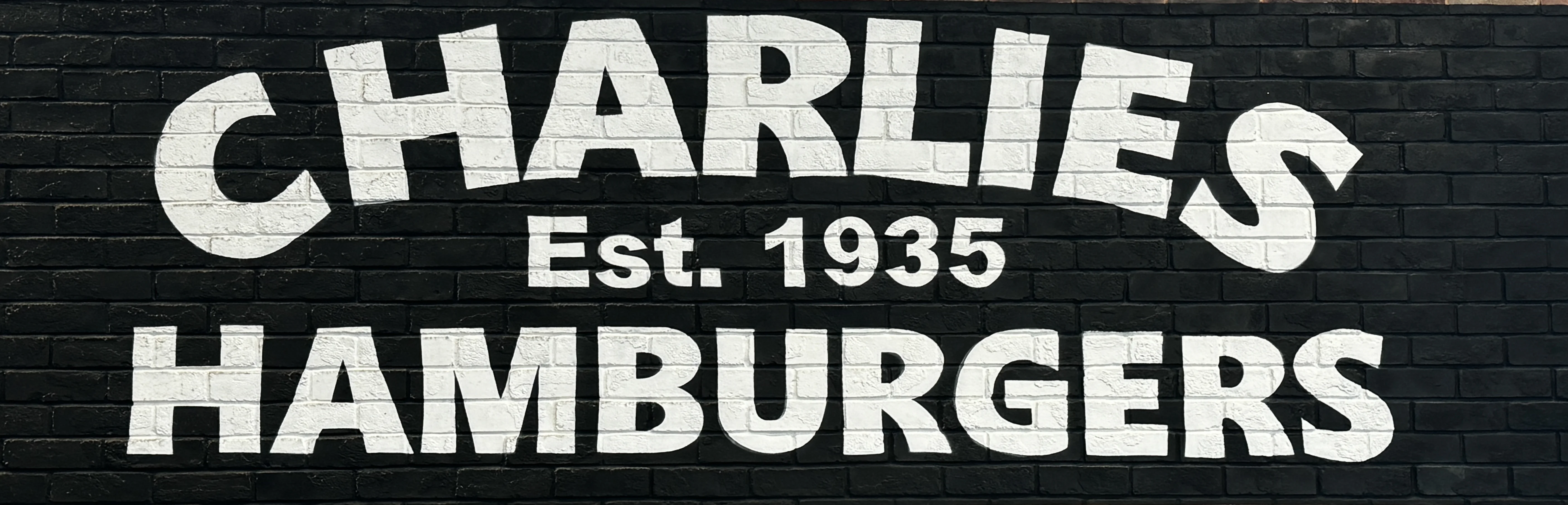 Charlies Hamburgers Established 1935 Sign