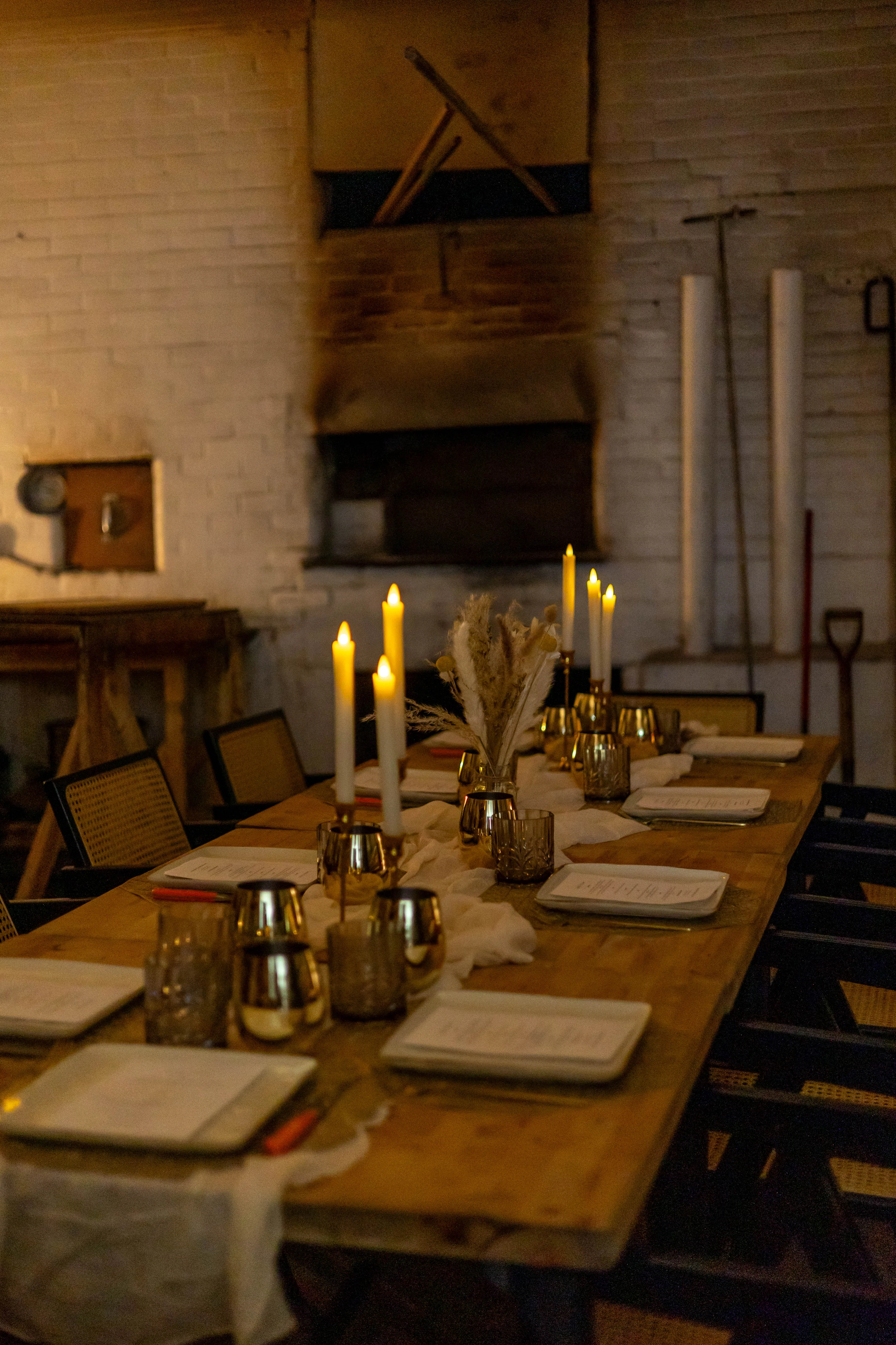Cozy restaurant dining setup with candles and rustic decor
