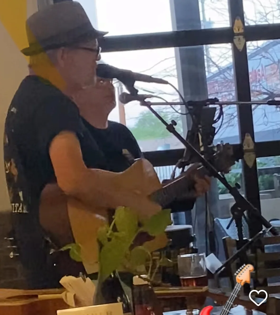 Live music performance in a cozy restaurant setting