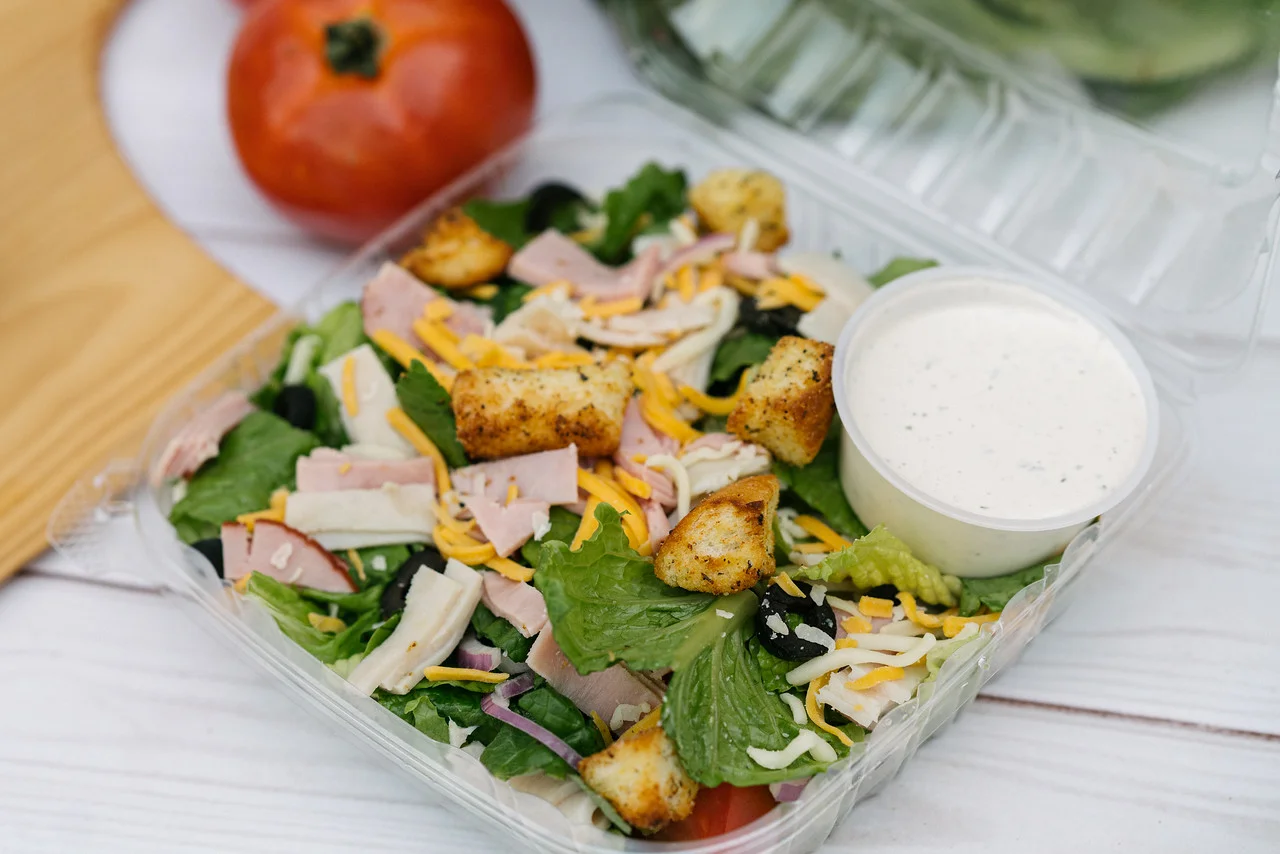 Fresh garden salad with grilled chicken and ranch dressing