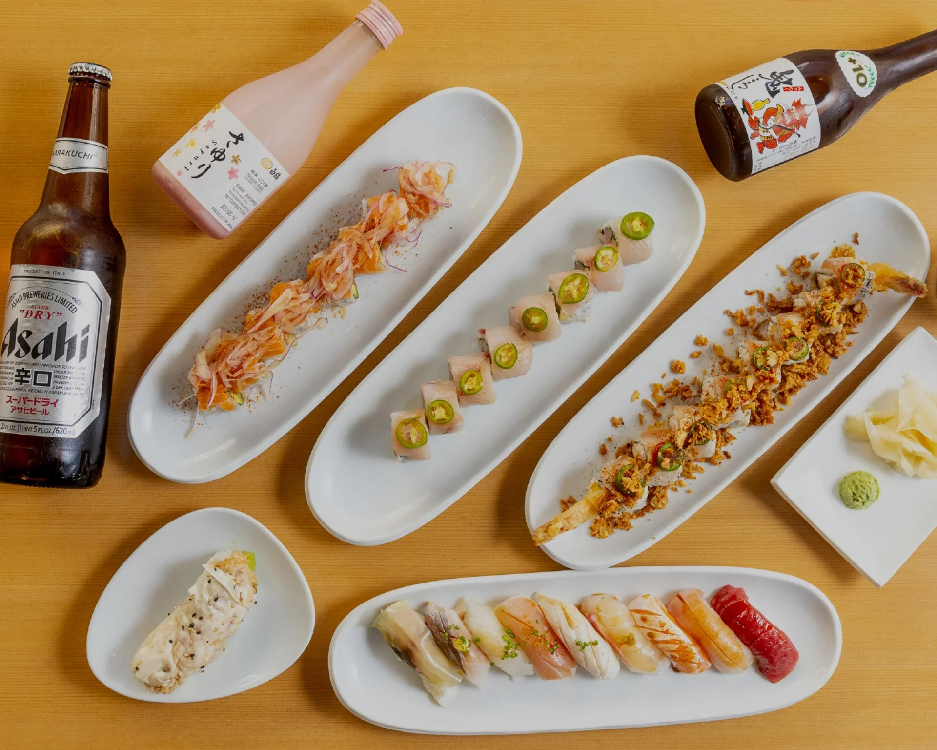 Assorted Japanese sushi platter with sake and beer