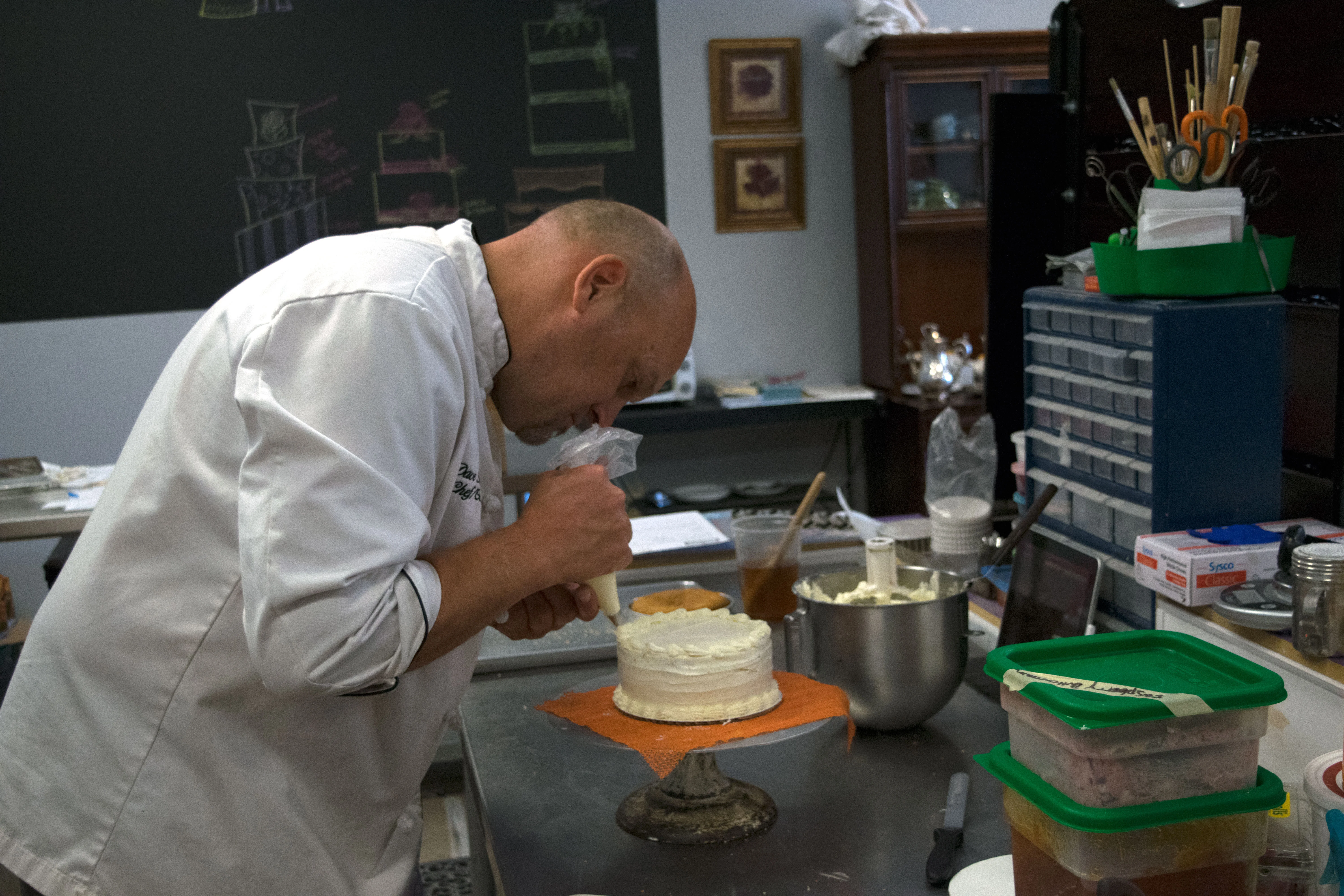A restaurant chef preparing a dish