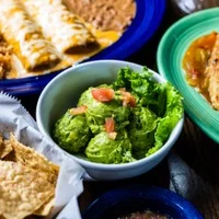 Bowl of guacamole served with Mexican dishes