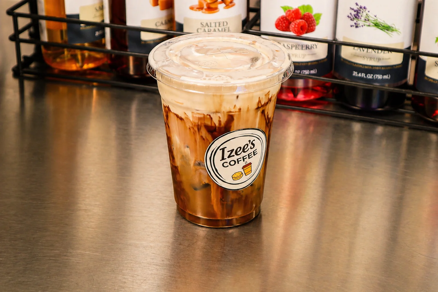 Izee's Coffee shop logo featuring a coffee cup and stylish typography.