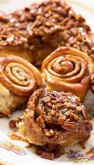 Pecan sticky buns on a decorative plate