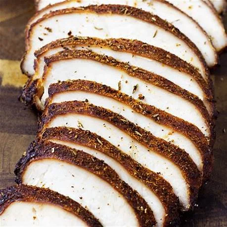 Sliced smoked pork loin with a flavorful crust