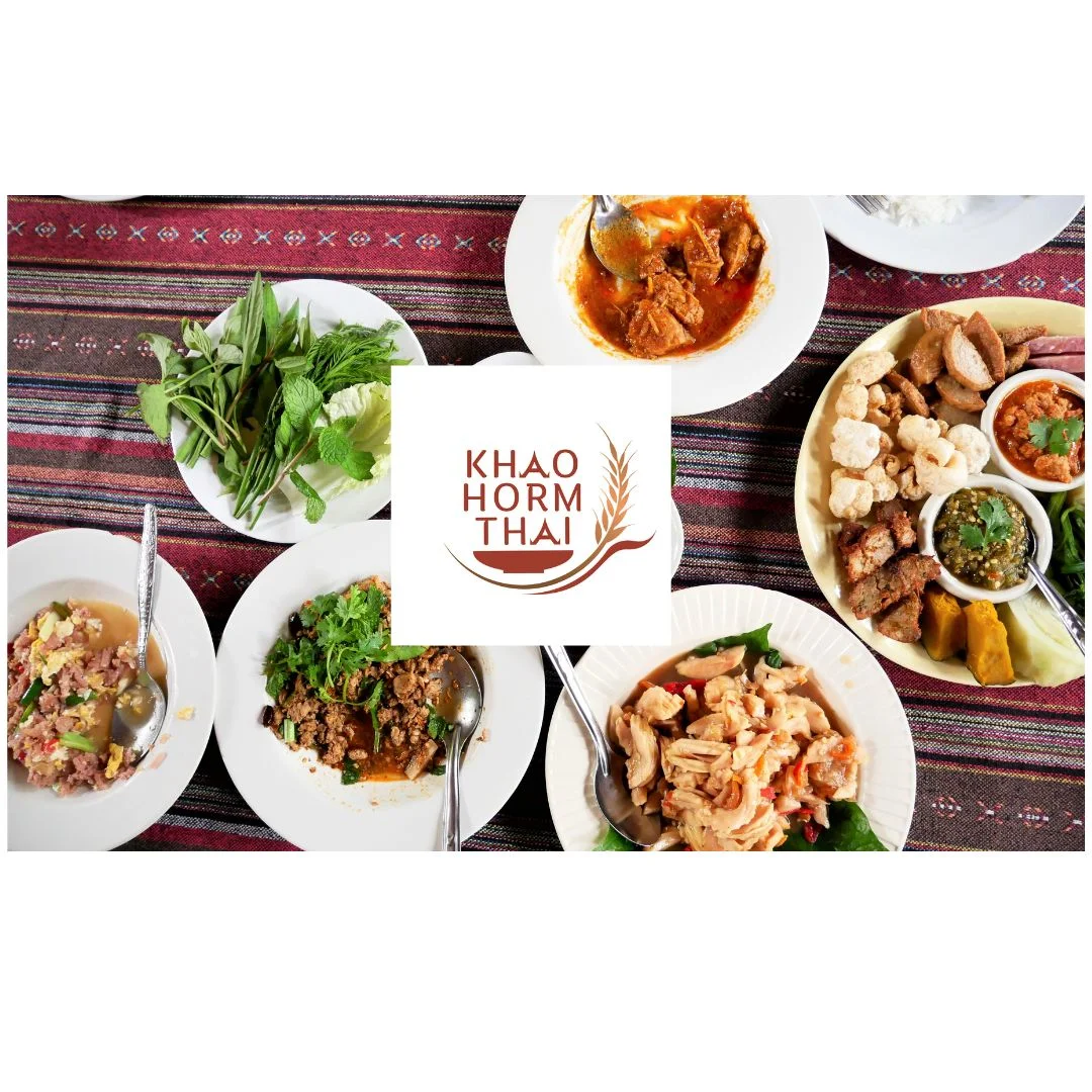 Assorted Thai dishes served on a traditional table setting