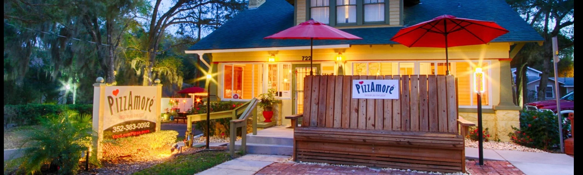 Charming pizza restaurant exterior with cozy seating