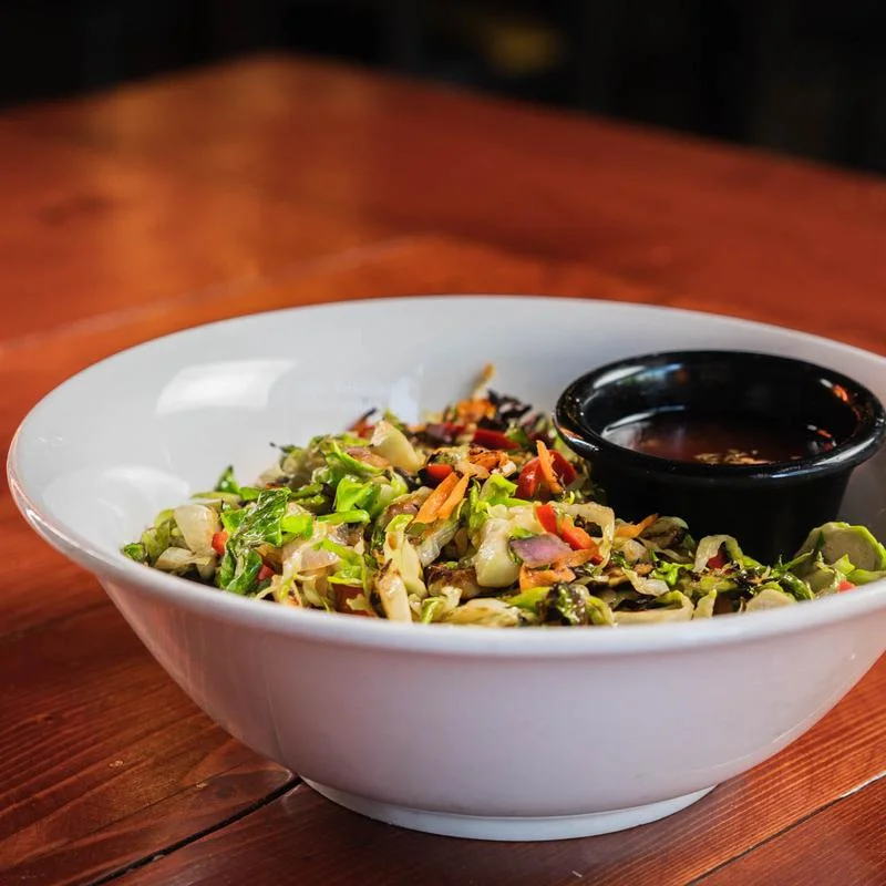 Fresh Asian-style salad with dipping sauce