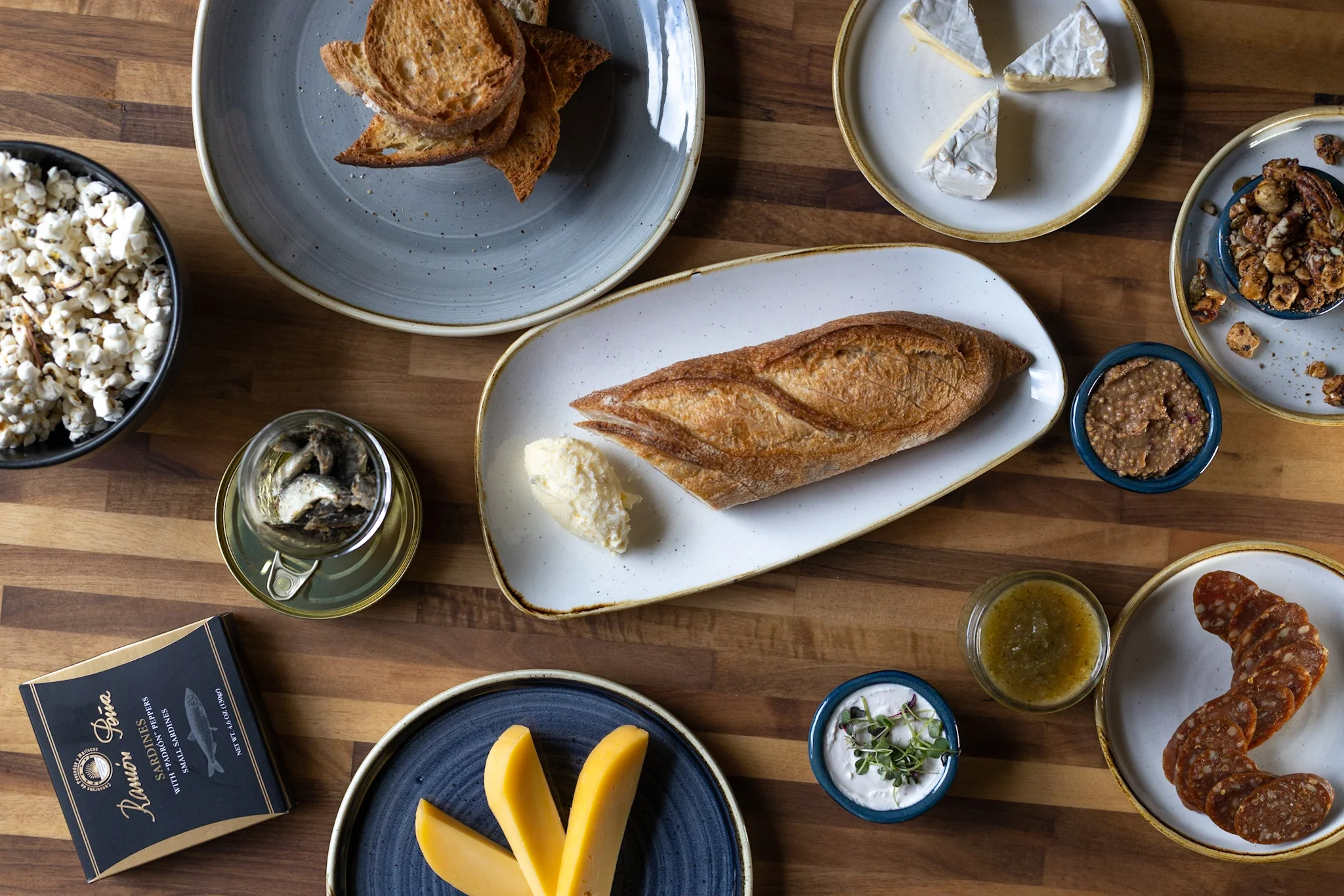 Artisanal charcuterie board with bread and cheeses