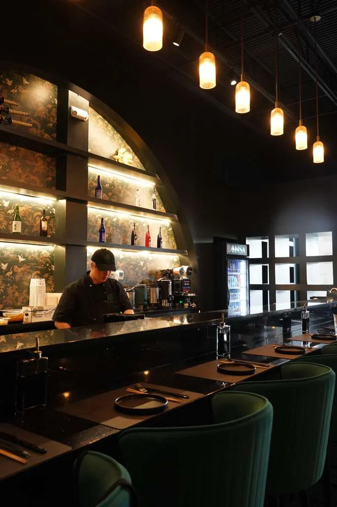 Modern restaurant interior with bar and stylish lighting