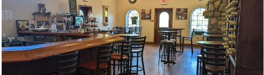 Cozy restaurant interior with wooden bar and seating