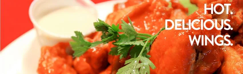 Spicy buffalo wings served with ranch dressing