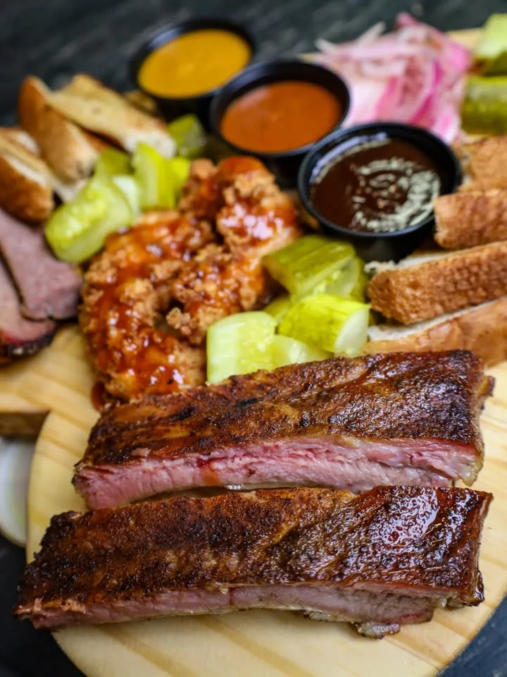 Texas-style barbecue platter with ribs and sides