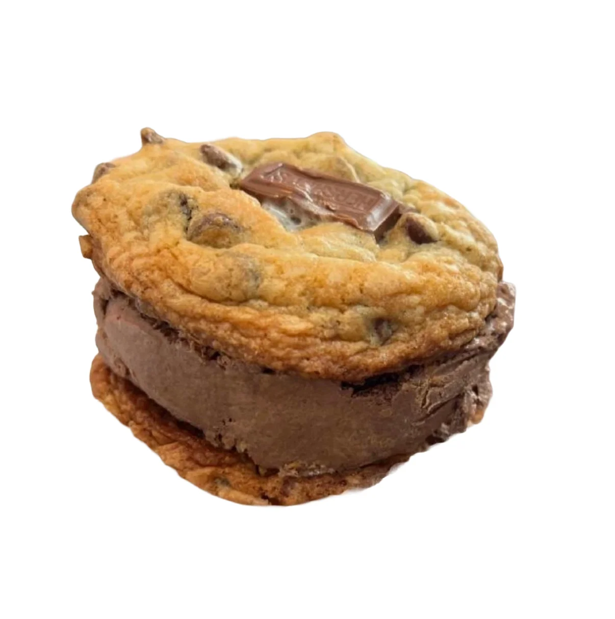 A delicious cookie sandwich filled with creamy ice cream, resting on a heart-shaped plate.