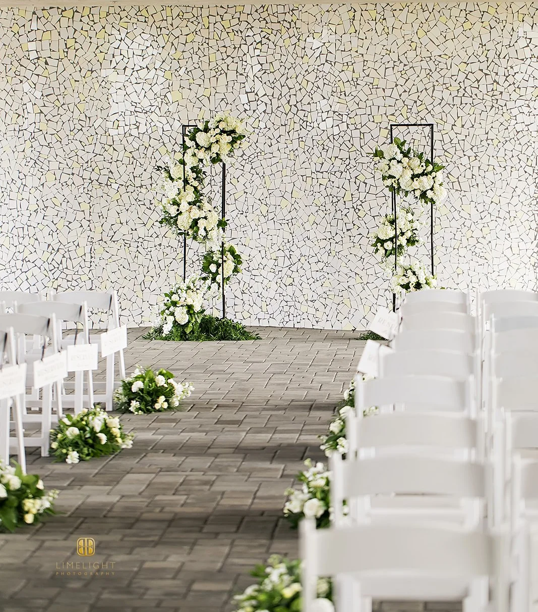 Elegant wedding ceremony setup with floral decor