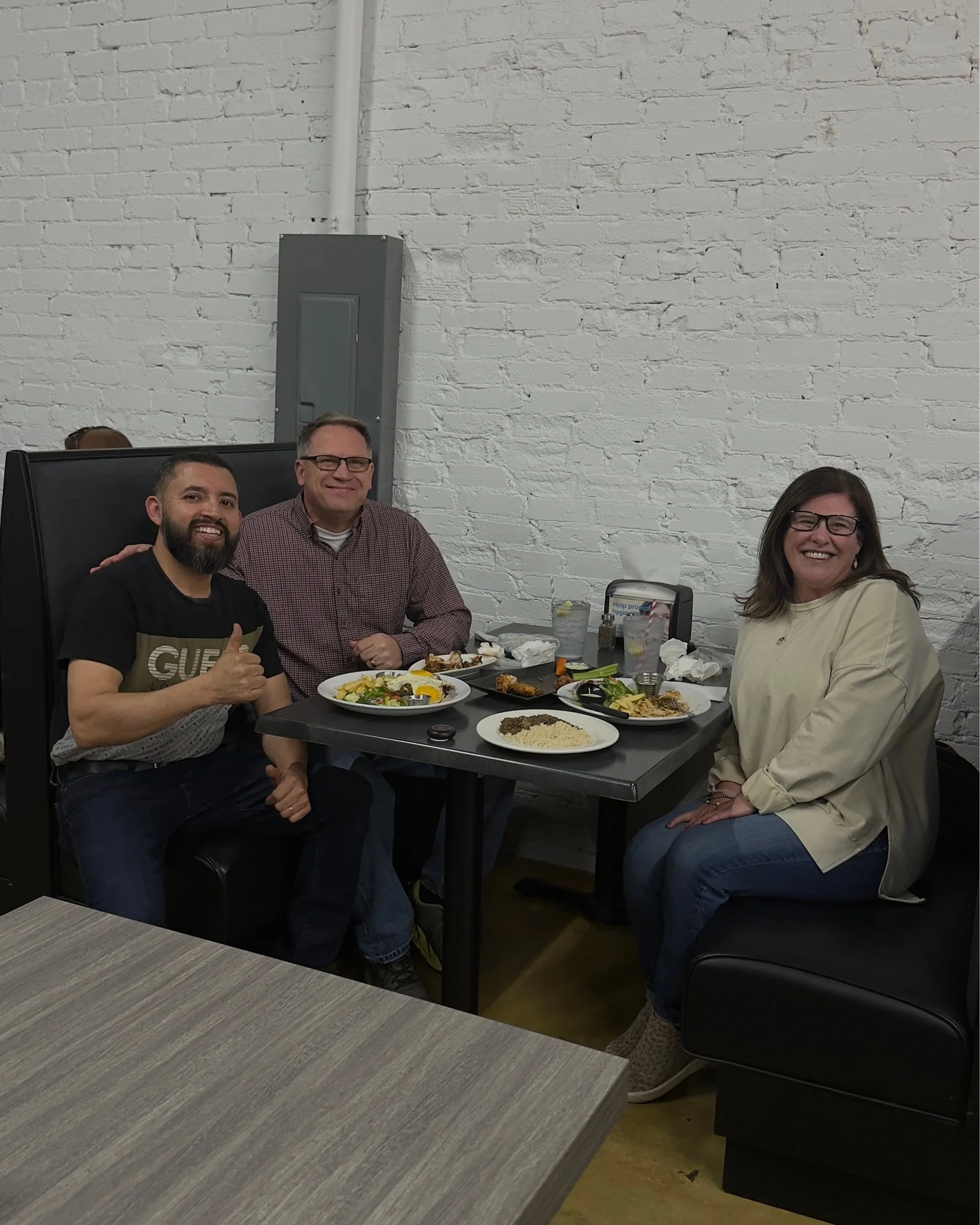 Cozy restaurant dining with friends enjoying diverse dishes