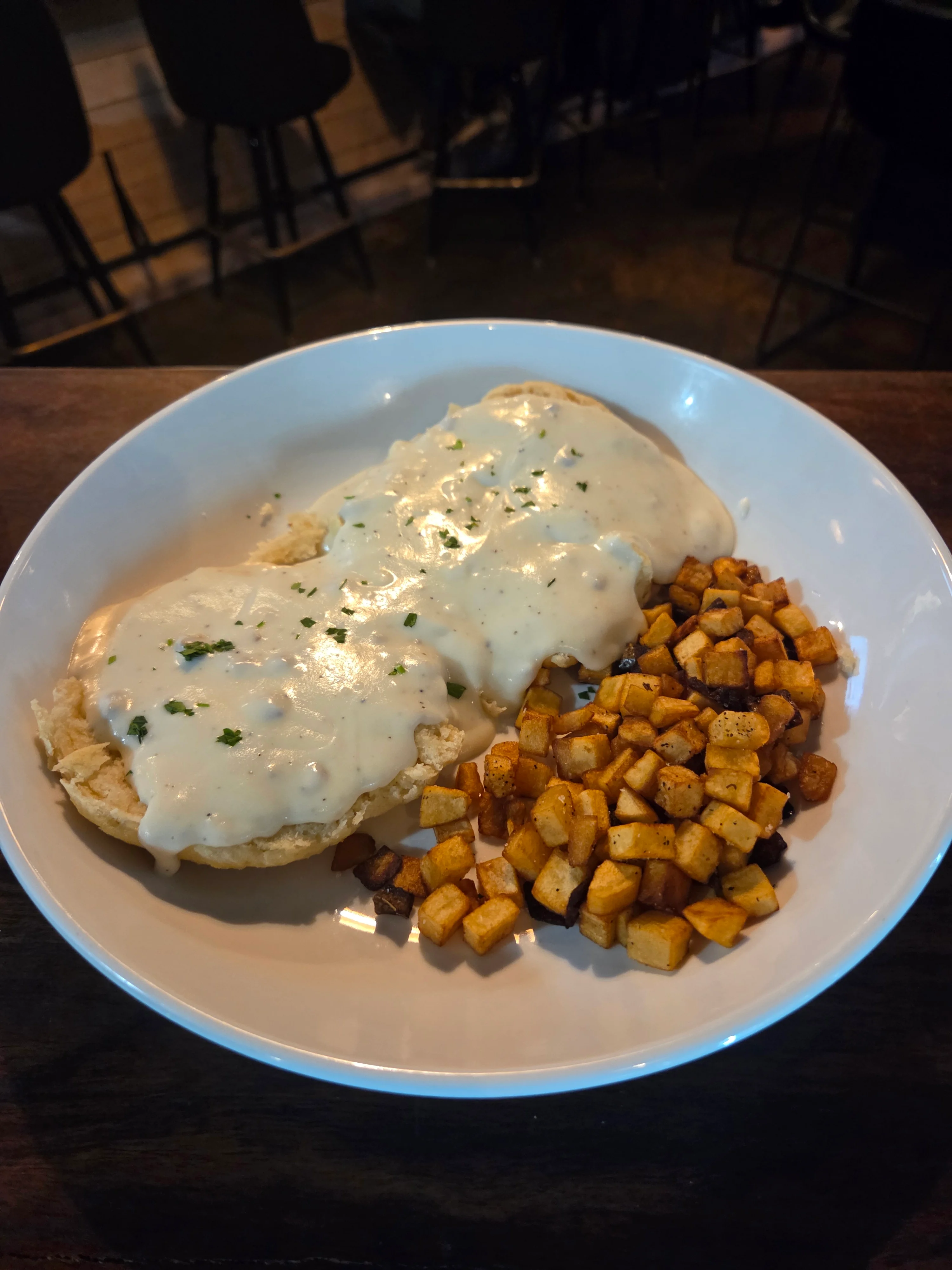Southern biscuits and gravy with crispy potatoes