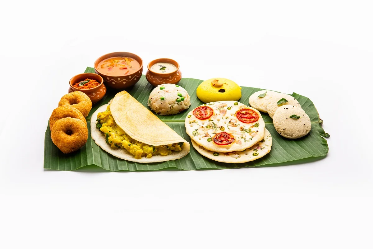 South Indian breakfast platter with dosa, idli, and vada