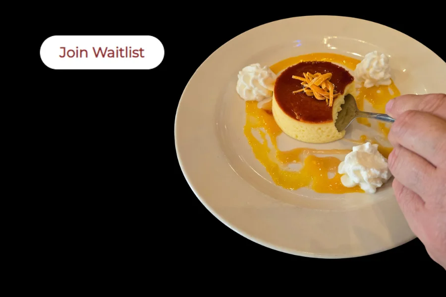 Delicious flan dessert with caramel sauce and whipped cream