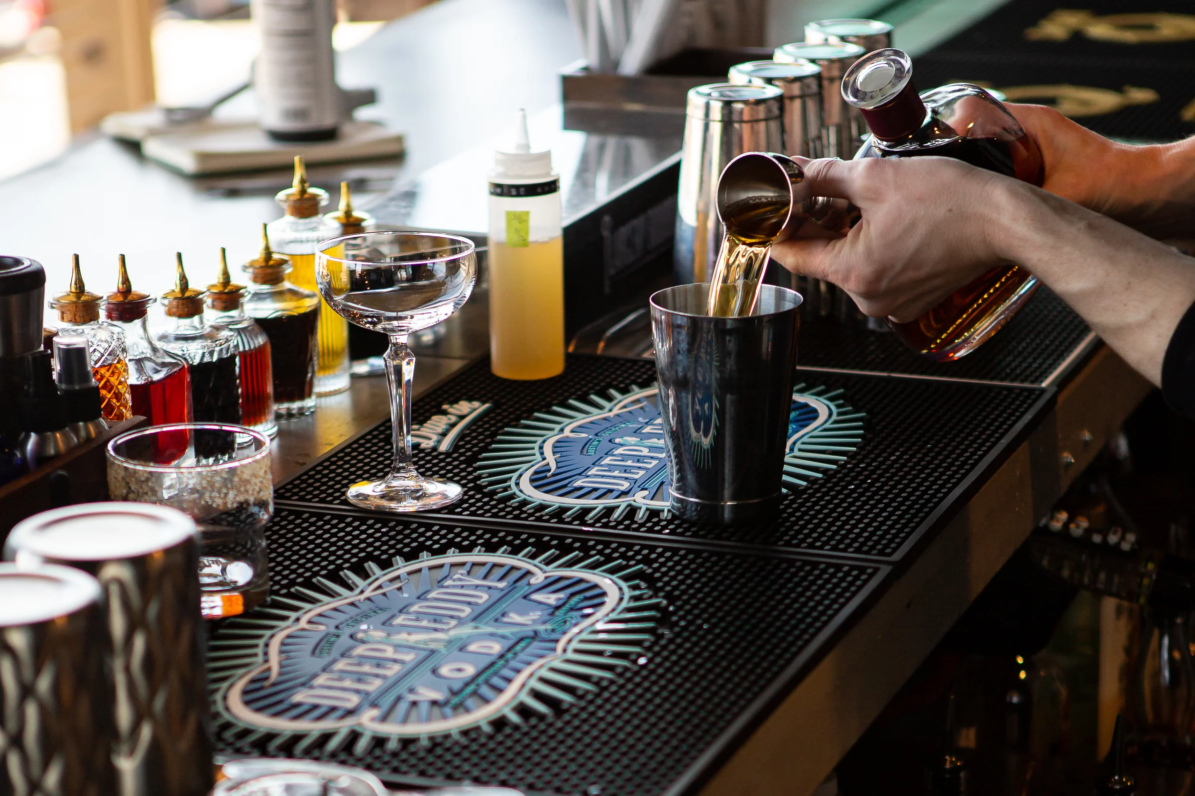 LR Bar making a cocktail