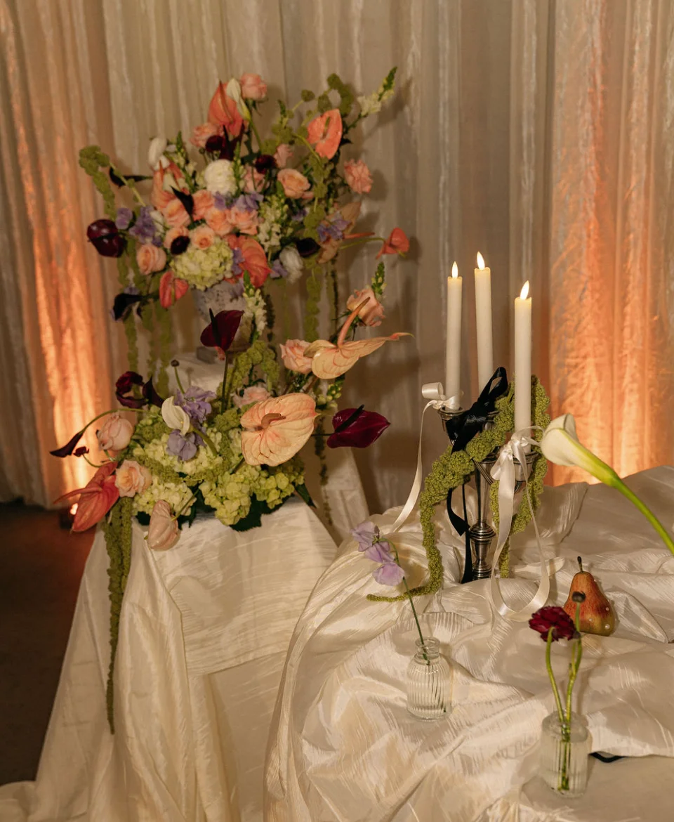 Elegant floral arrangement with candles and decor