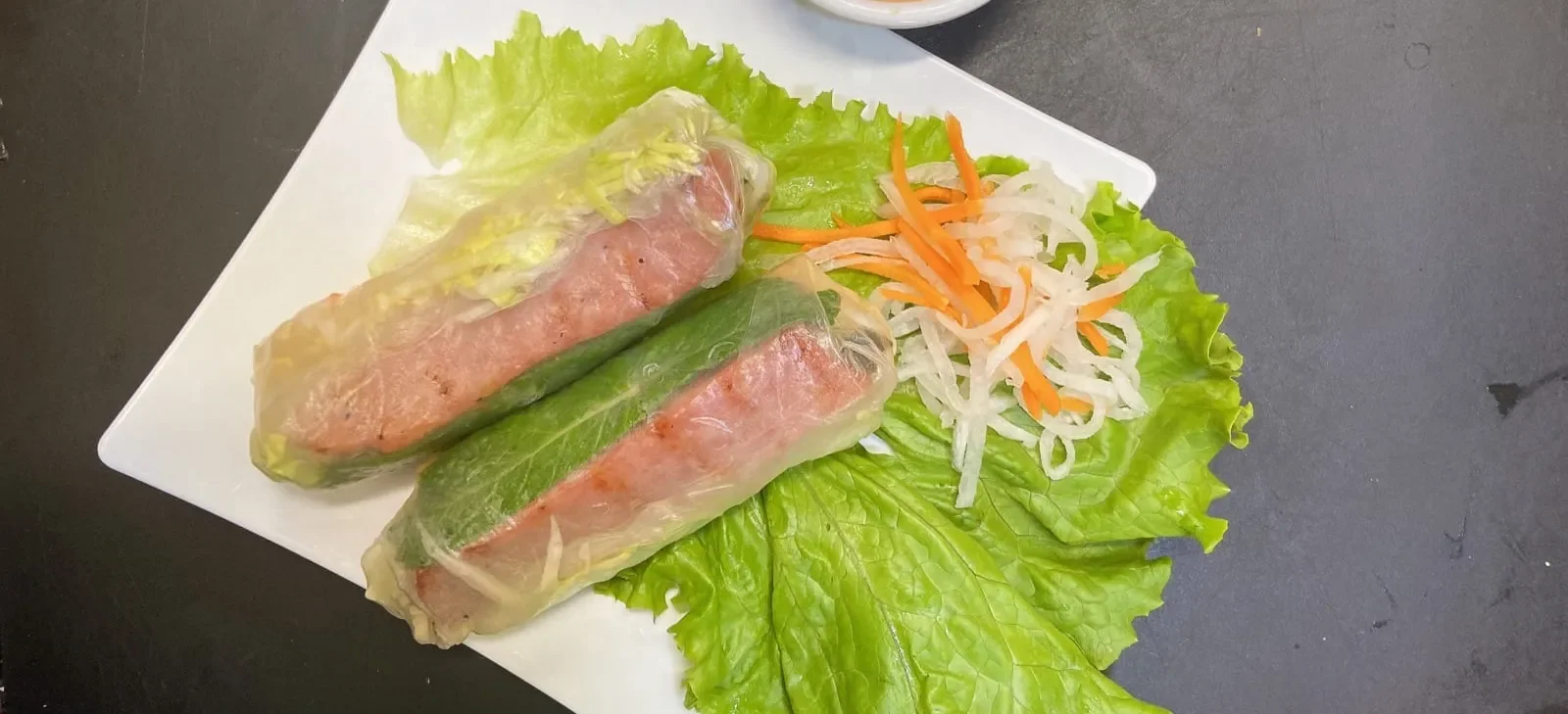 Vietnamese spring rolls with fresh herbs and vegetables