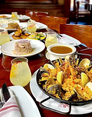Vibrant seafood paella served in a traditional pan