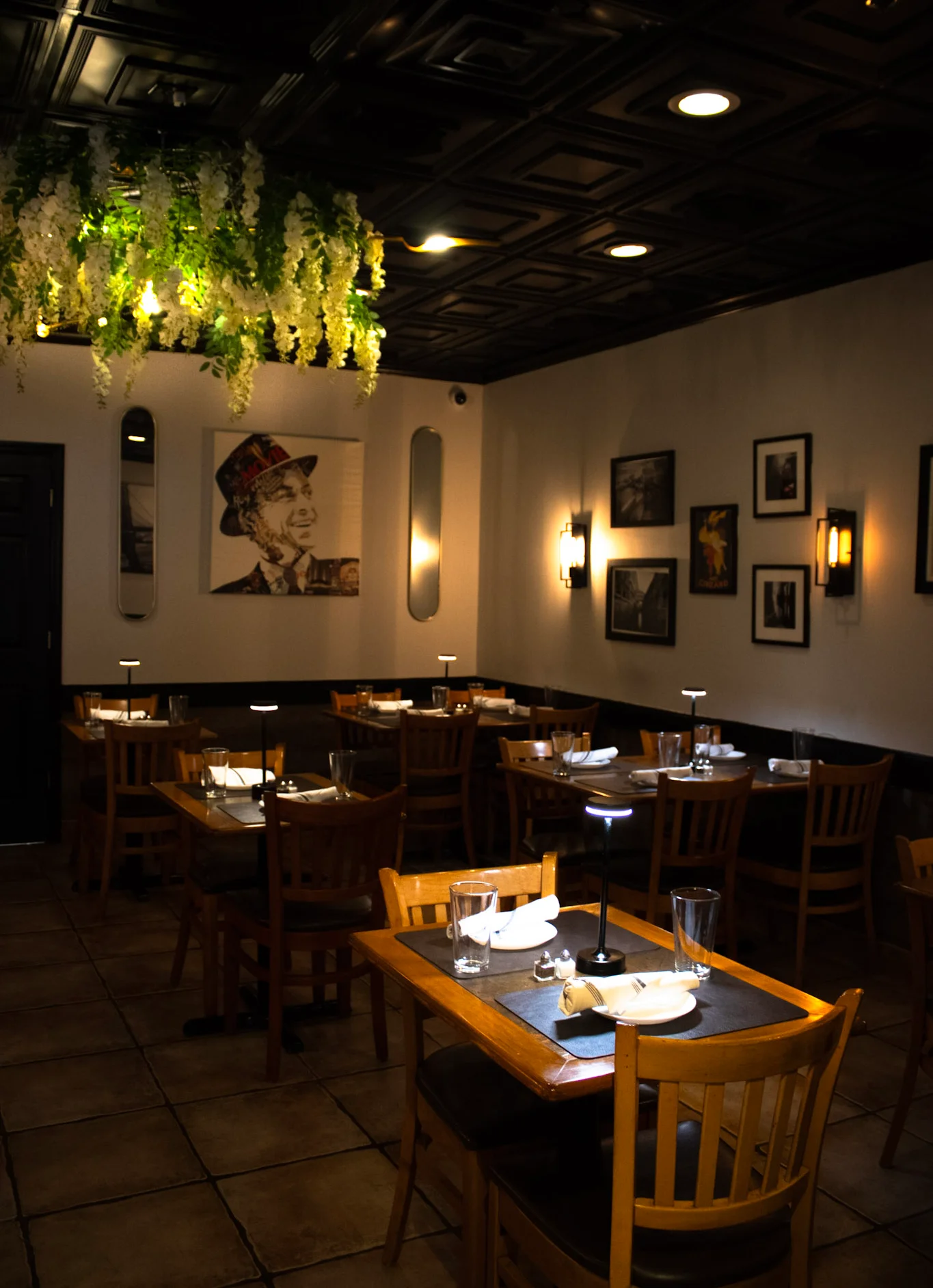 Cozy restaurant interior with warm lighting and artistic decor