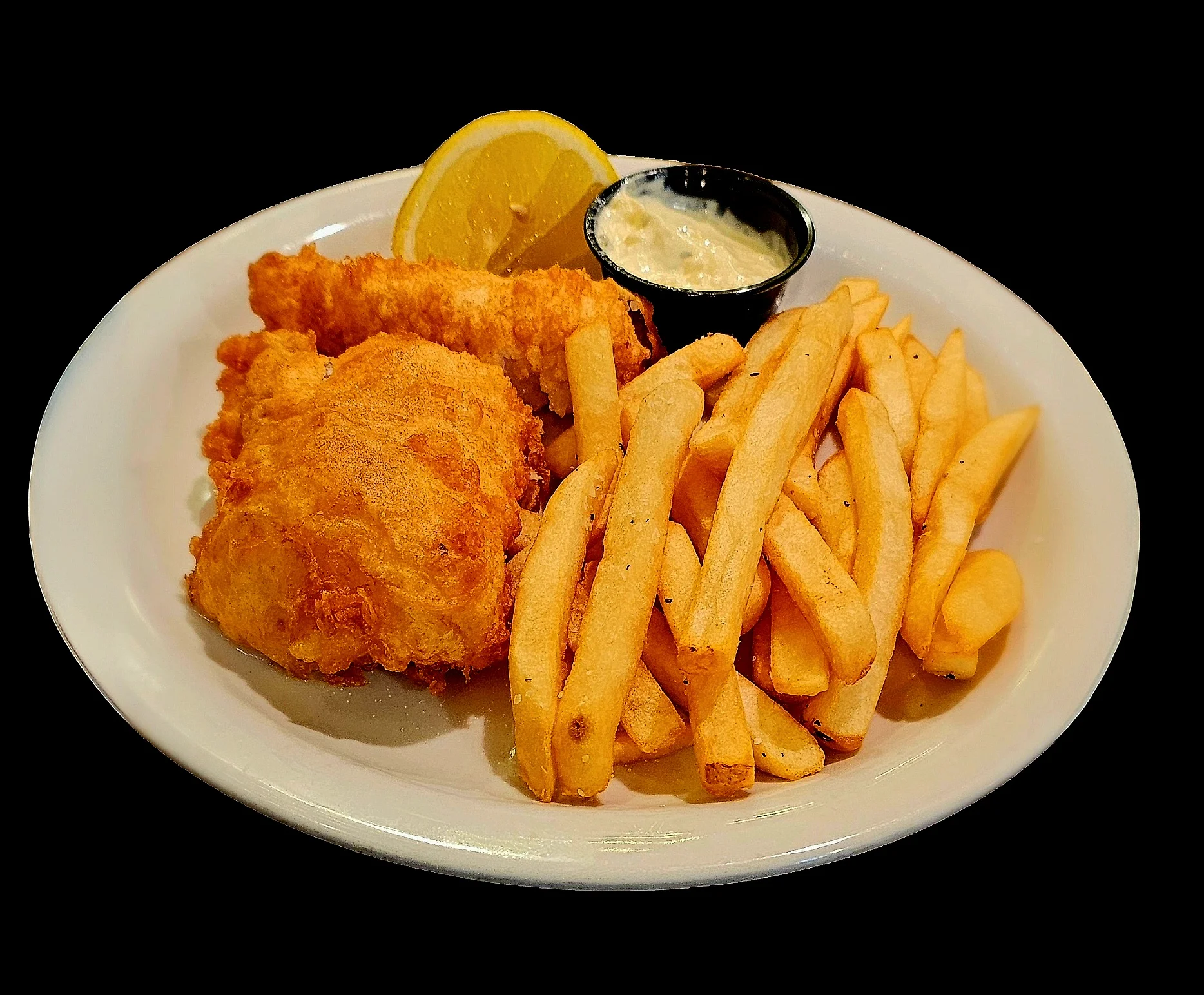Southern fried chicken with fries and lemon